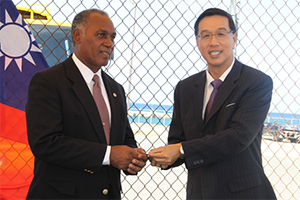 Republic of China (Taiwan)’s Resident Ambassador to St. Kitts and Nevis His Excellency Miguel Tsao handing over the keys of a refuse disposal truck for use by the Nevis Solid Waste Management Authority to Premier of Nevis Hon. Vance Amory at a ceremony at Long Point on July 21, 2014